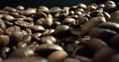 Roasted coffee beans whole. High quality texture of coffee Stock Footage 143171252