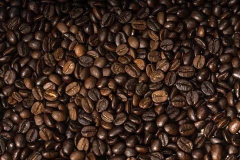 Roasted coffee consumers. Coffee objects are laid out on the surface. Food ph Stock Photos