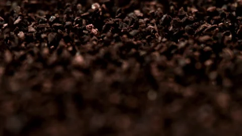 Roasted Coffee Grounds Forming Rich Textured Brown Surface 스톡 동영상 336463102