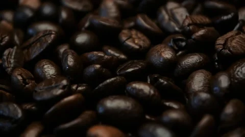 Roasted coffee. Roasted coffee beans. Circular motion. Loop Stock Footage 156693593