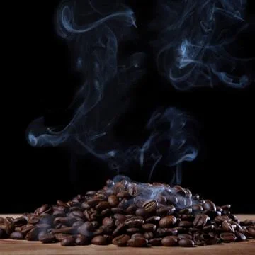 Roasted coffee with smoke Stock Photos