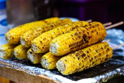 Roasted corn on the grill. Stock Photos
