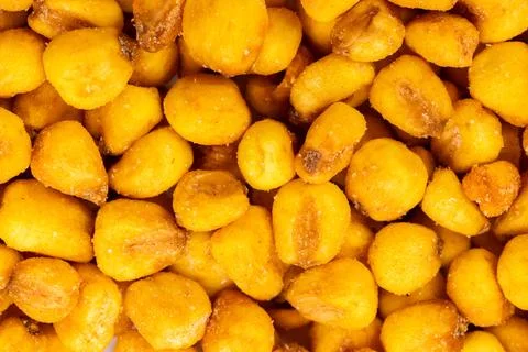 Roasted corn nuts offering crunchy salty snack texture Stock Photos