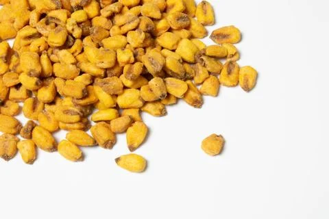 Roasted corn nuts on white background Stock Photos