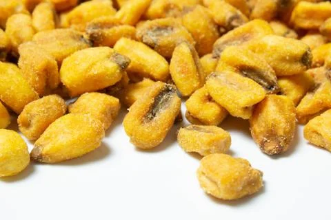 Roasted corn nuts on white background Foto stock