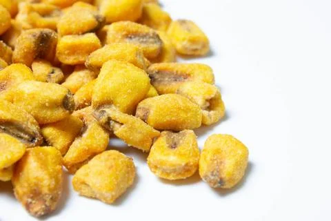 Roasted corn nuts on white background Stock Photos