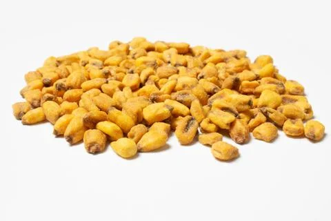 Roasted corn nuts on white background Stock Photos