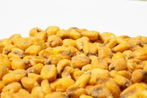 Roasted corn nuts on white background Stock Photos