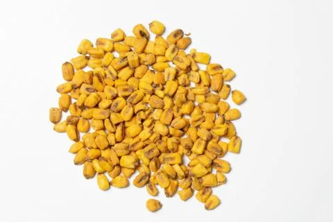 Roasted corn nuts on white background Stock Photos