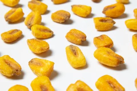 Roasted corn nuts on white background Stock Photos