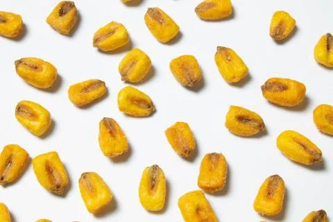 Roasted corn nuts on white background Stock Photos