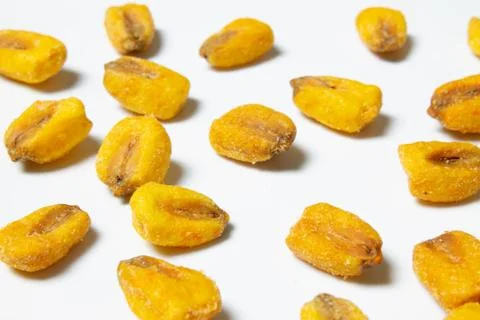 Roasted corn nuts on white background Stock Photos