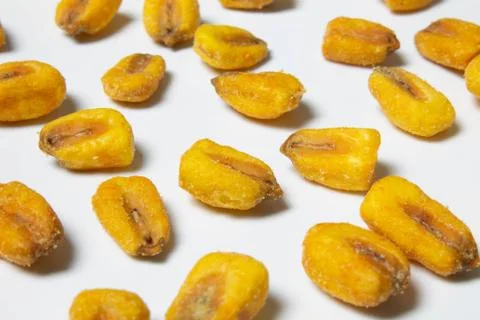 Roasted corn nuts on white background Stock Photos