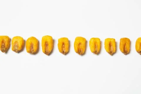 Roasted corn nuts on white background Stock Photos