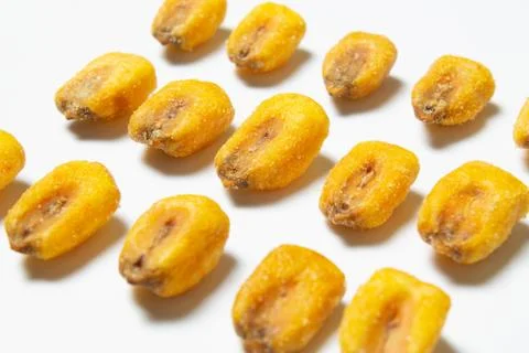 Roasted corn nuts on white background Foto stock