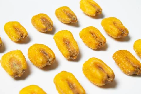 Roasted corn nuts on white background Stock Photos