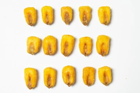 Roasted corn nuts on white background Stock Photos