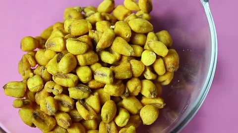 Roasted corn seeds in plate Stock Footage 151865072