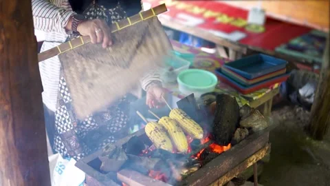 Roasted corn slow motion Video stock 242897376