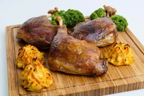 Roasted crispy duck leg Stock Photos