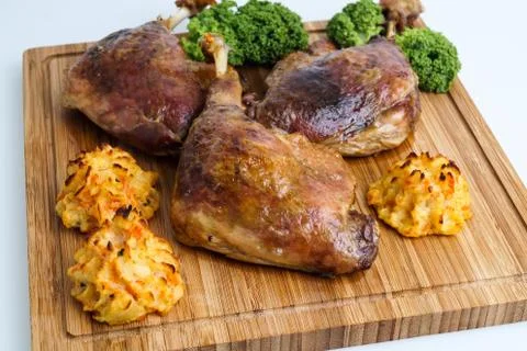 Roasted crispy duck leg Stock Photos