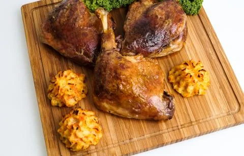 Roasted crispy duck leg Stock Photos