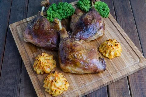 Roasted crispy duck leg Stock Photos