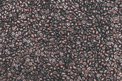 Roasted dark coffee beans background Stock Photos