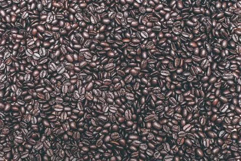 Roasted dark coffee beans background Stock Photos