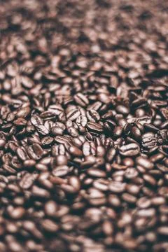 Roasted dark coffee beans background Stockfoto's