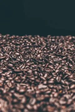 Roasted dark coffee beans background Stock Photos