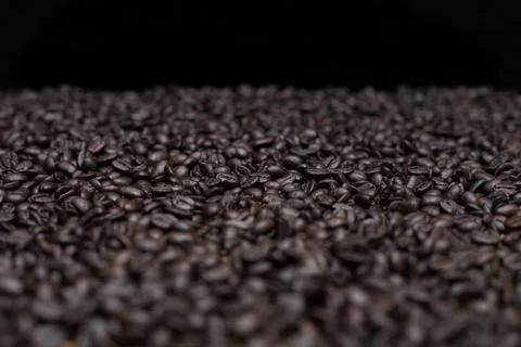 Roasted dark coffee beans background Stockfoto's