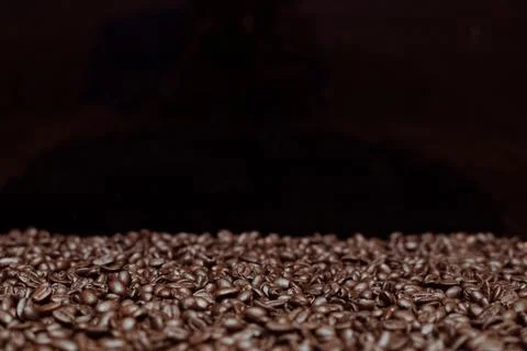 Roasted dark coffee beans background Stockfoto's