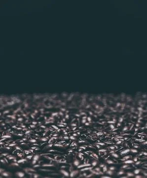 Roasted dark coffee beans background Stockfoto's