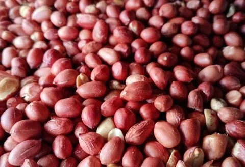 Roasted delicious red peanuts Stock Photos