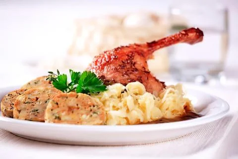 Roasted duck leg with mashed potatoes and veggies Stock Photos