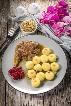 Roasted duck leg. Stock Photos