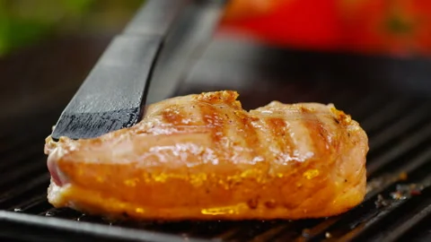 Roasted Duck Leg Served with Vegetable Garnish Stock Footage 146132659