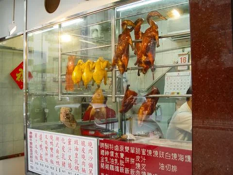 Roasted ducks and chickens. Stock Photos