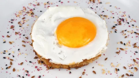 Roasted Egg yolk on meat Cutlet, served in Restaurant Stock Footage 95153986