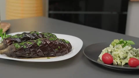 Roasted Eggplant and Dip on Table in Cooking Kitchen Stock Footage 341431942