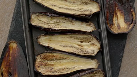 Roasted eggplant halves. Stock Footage 342347853