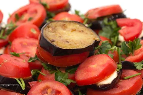 Roasted eggplant with tomatoes Stock Photos