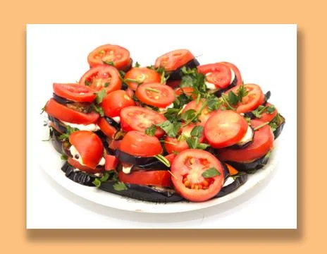 Roasted eggplant with tomatoes Stock Photos