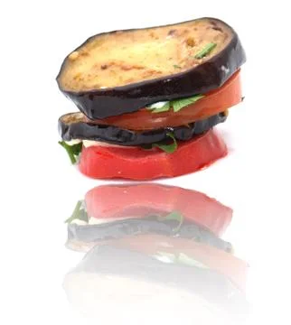 Roasted eggplant with tomatoes Stock Photos