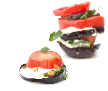 Roasted eggplant with tomatoes Stock Photos