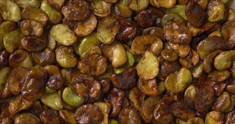 Roasted fava beans background texture. Flat lay. Stock Footage 313835572