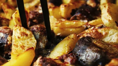 Roasted fish with potatoes in stove Stock Footage 158212394