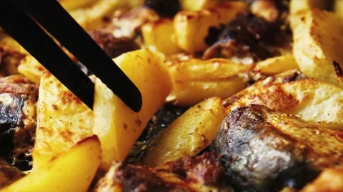 Roasted fish with potatoes in stove Stock Footage 158212476