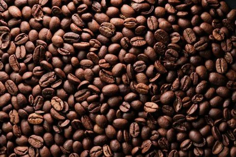 Roasted fragrant coffee beans background Stockfoto's